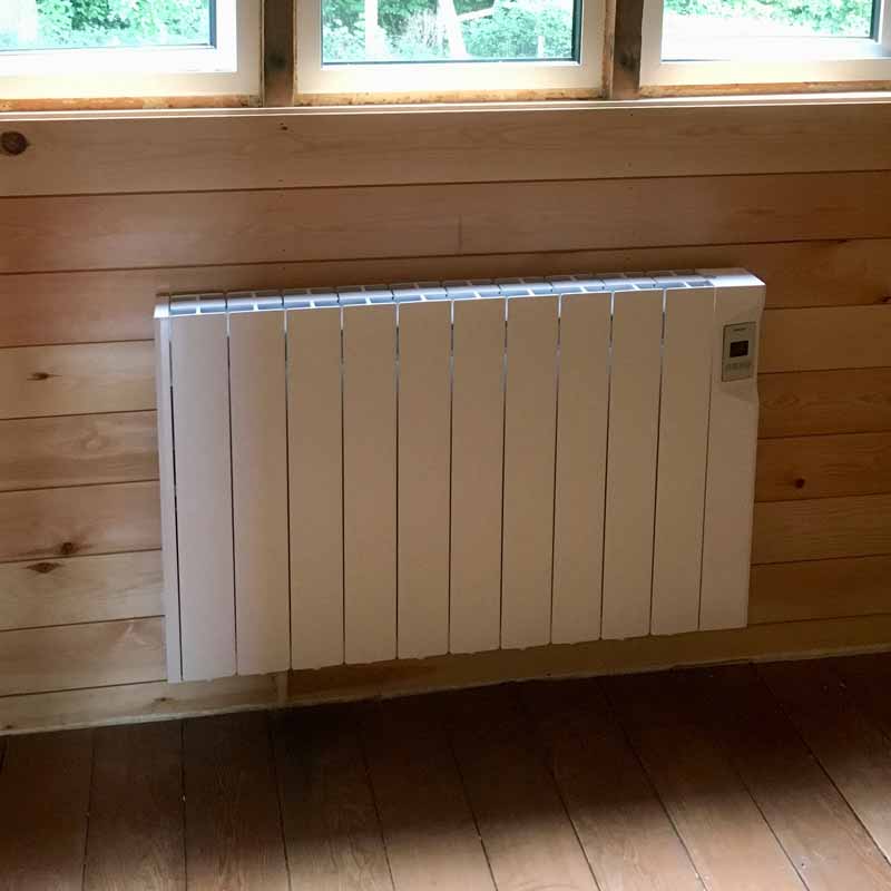 Smart electric radiator in an outbuilding